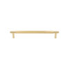 Modern brushed golden colored metal drawer pull handle isolated on white background.