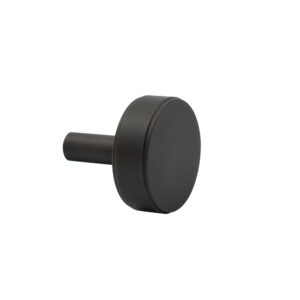 Black cabinet knob on a white background.