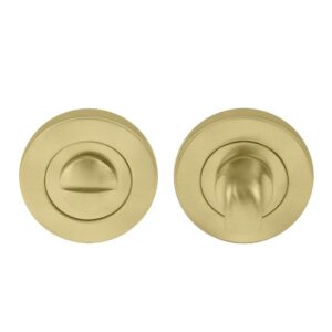 Two types of gold-colored round door knobs, one with a keyhole and one with a twist lock, isolated on white background.