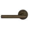 Stainless brown steel door handle on a white background, ideal for modern home and office use.