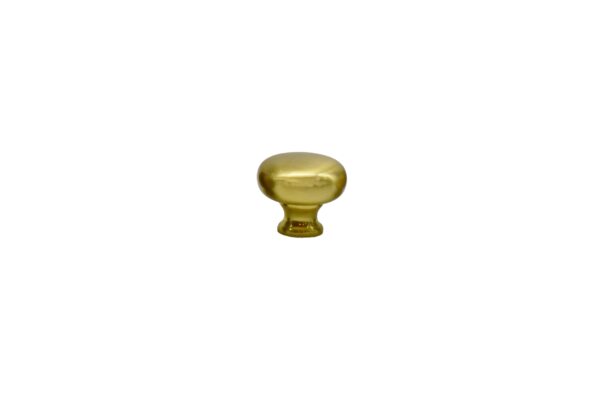 Shiny gold-colored ceramic knob on a white background.